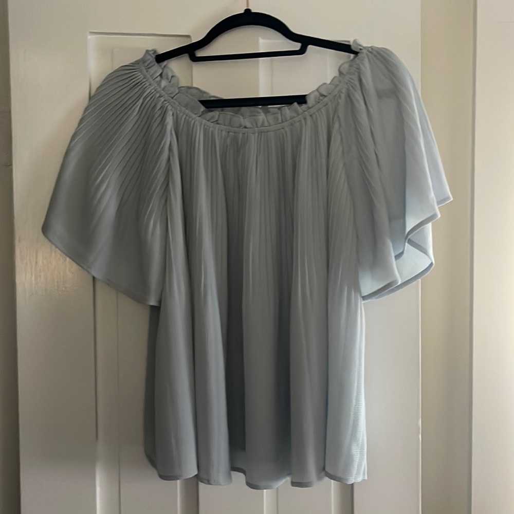 Blue off the shoulder shirt